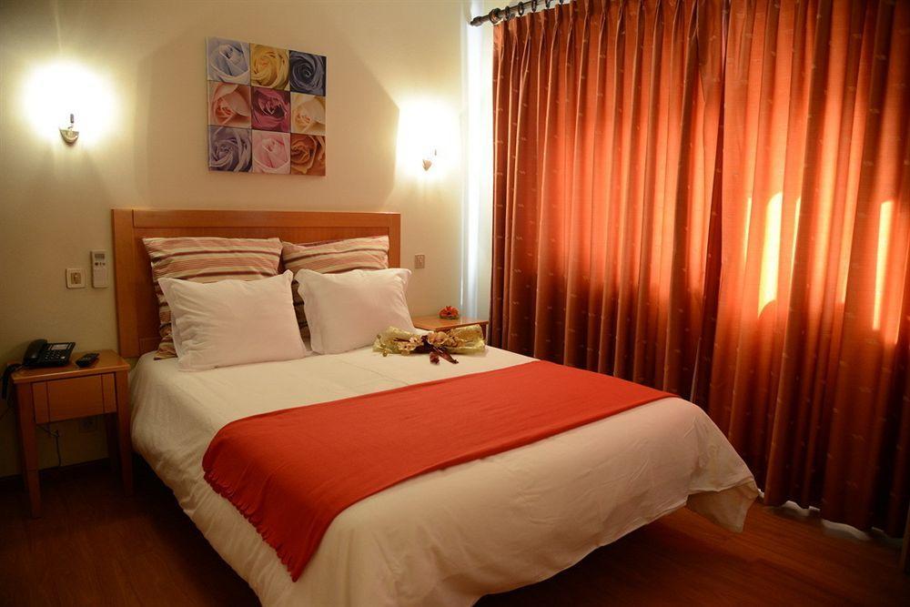 Hotel Dom Lourenco Areia Branca Bagian luar foto