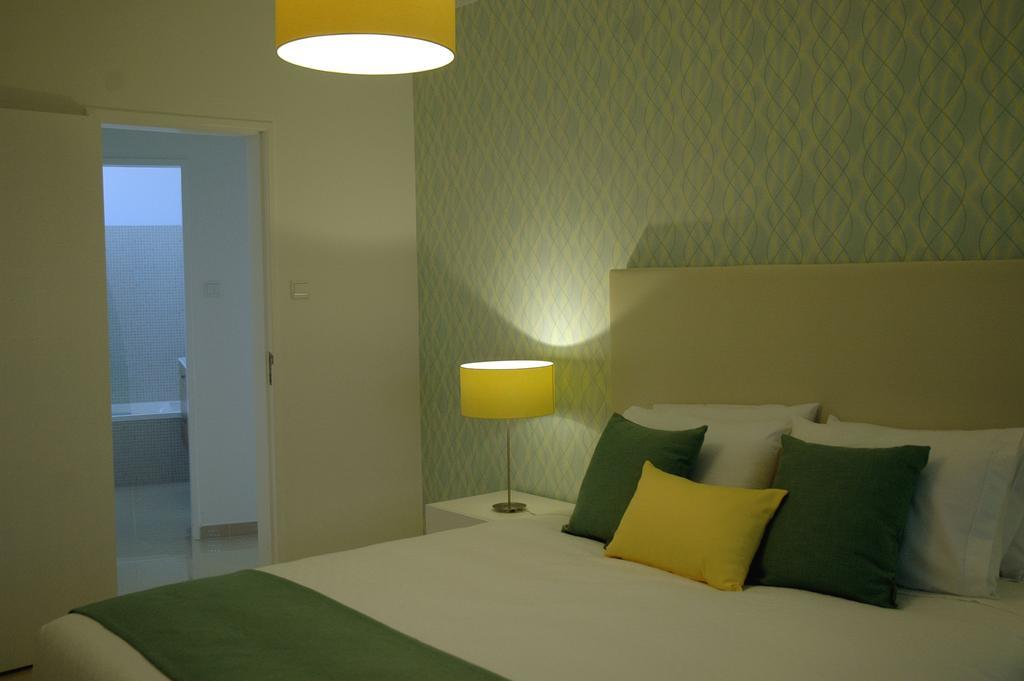 Hotel Dom Lourenco Areia Branca Bagian luar foto