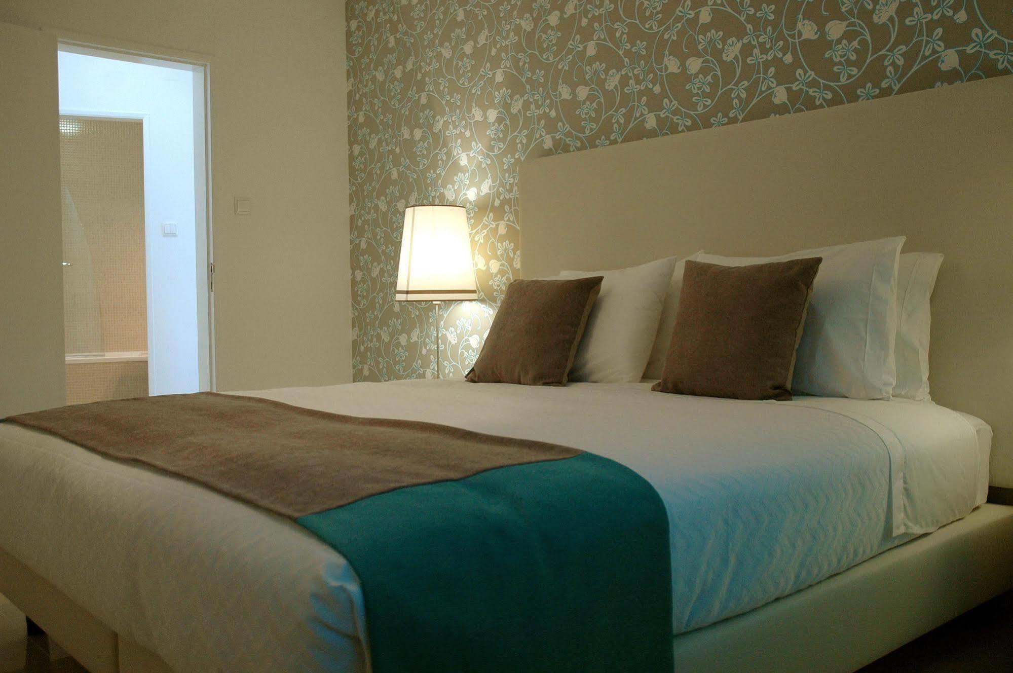 Hotel Dom Lourenco Areia Branca Bagian luar foto